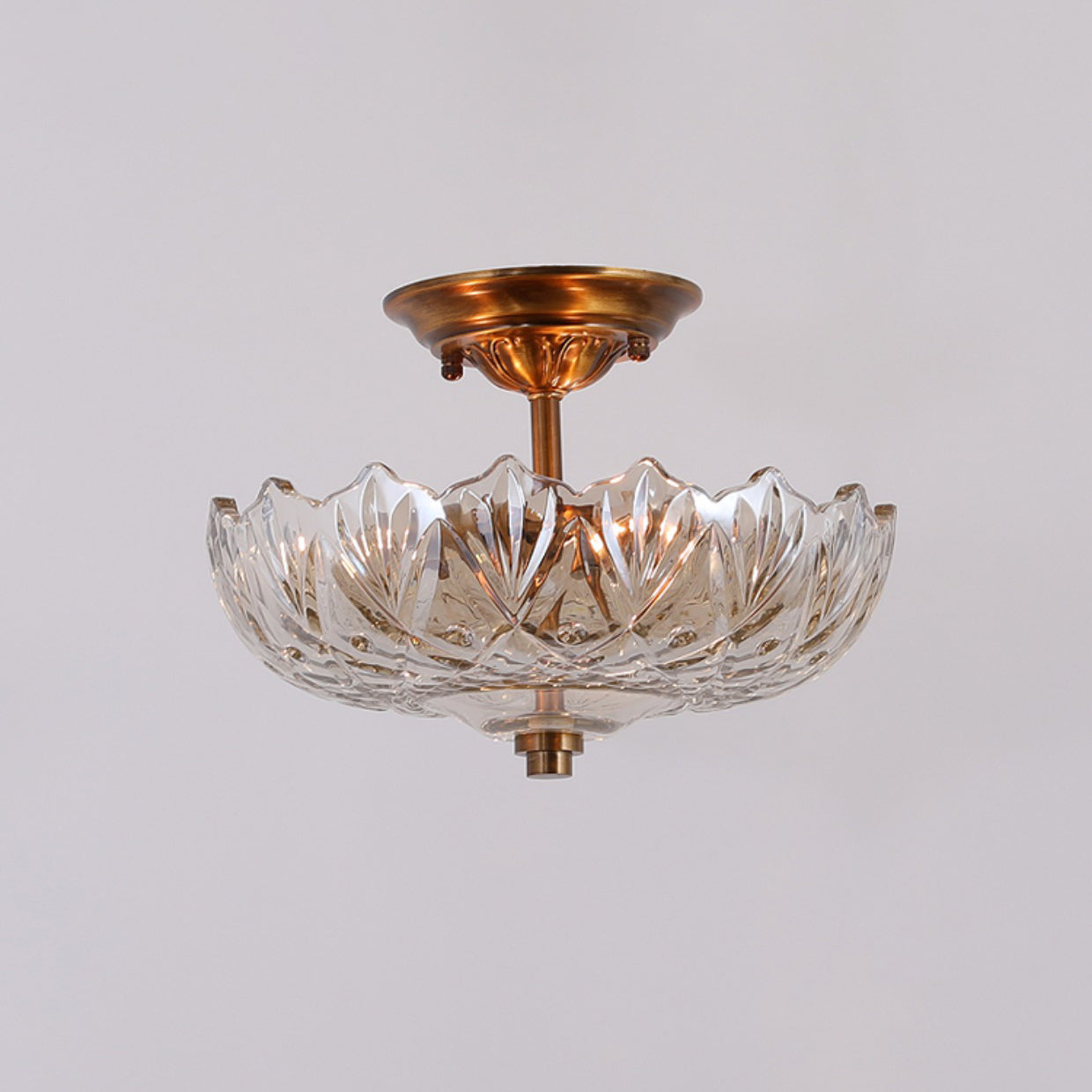 Compact Glass Ceiling Light – Brass Body with Amber Shades