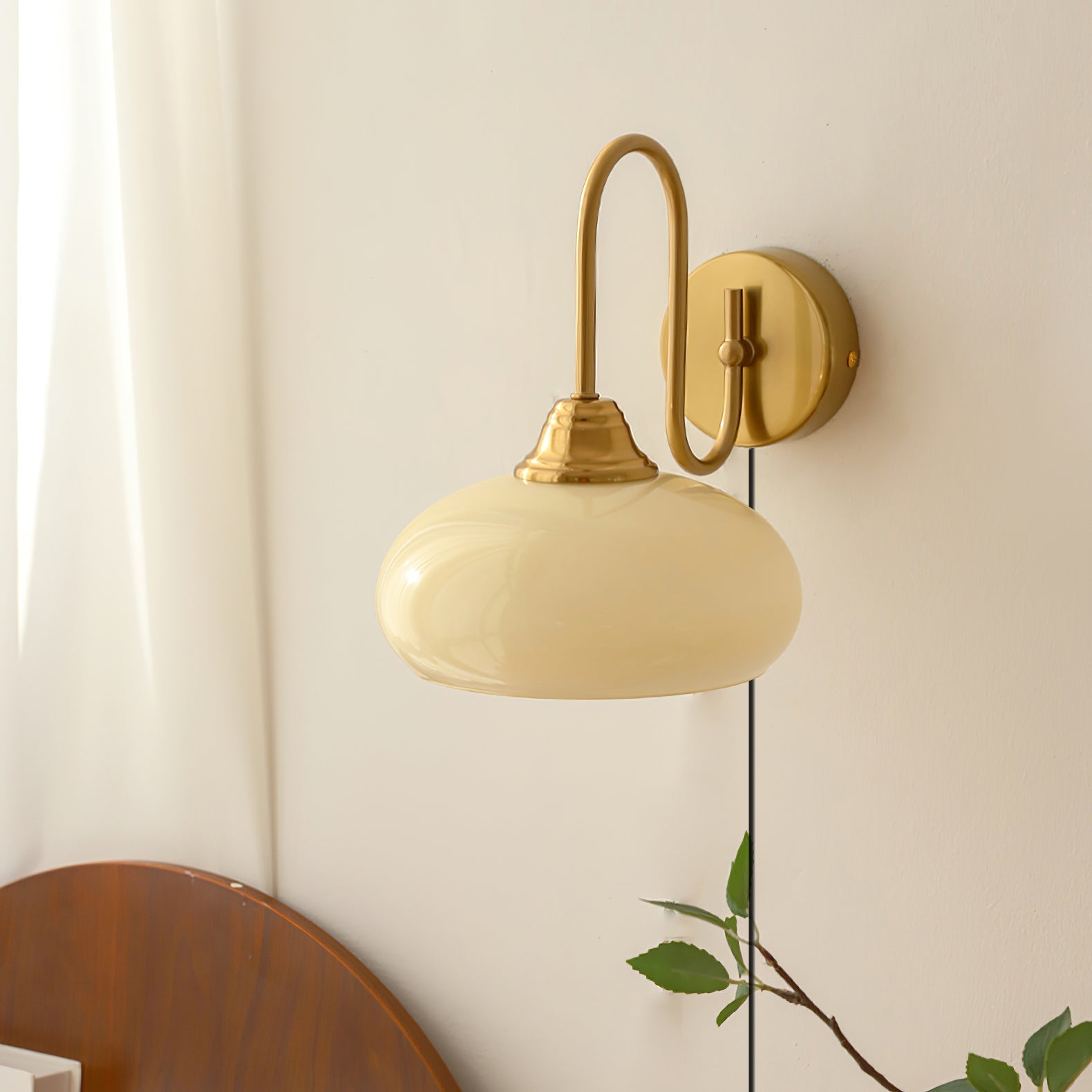 Modern Plug-in Wall Lamp with Clear Glass Shade and Brass Finish
