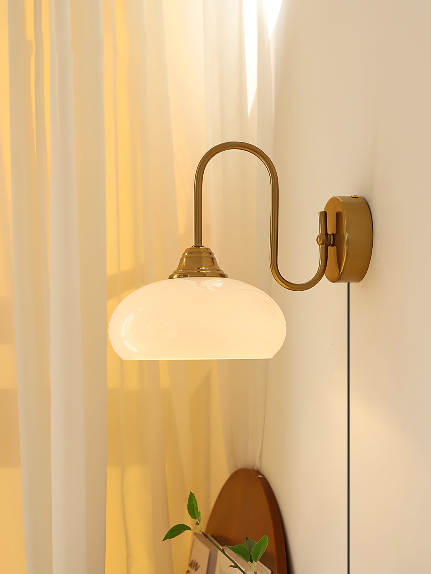 Modern Plug-in Wall Lamp with Clear Glass Shade and Brass Finish
