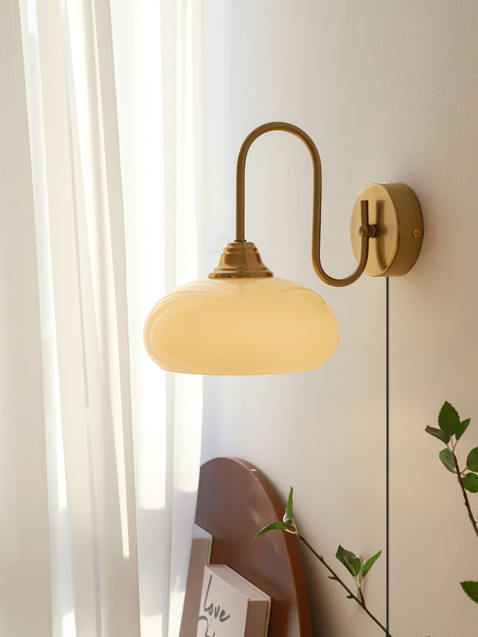 Modern Plug-in Wall Lamp with Clear Glass Shade and Brass Finish