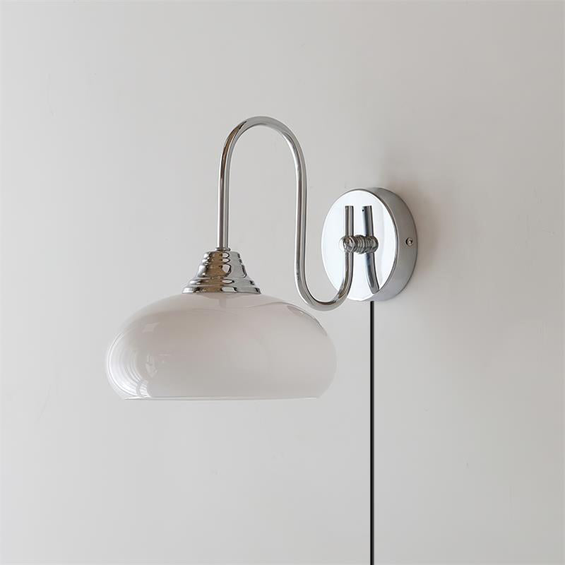 Modern Plug-in Wall Lamp with Clear Glass Shade and Brass Finish