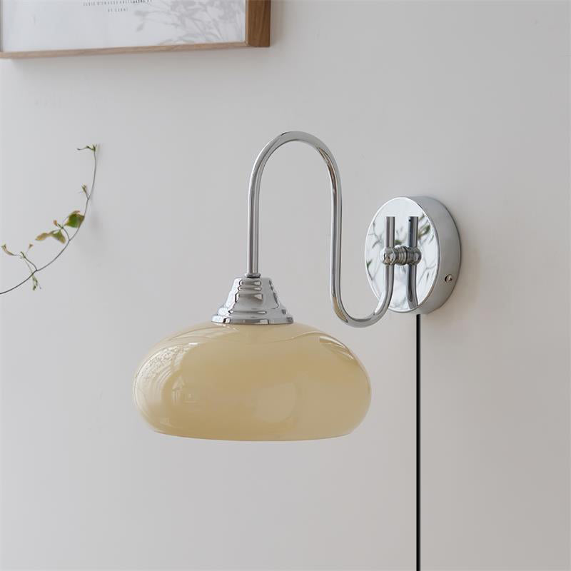 Modern Plug-in Wall Lamp with Clear Glass Shade and Brass Finish