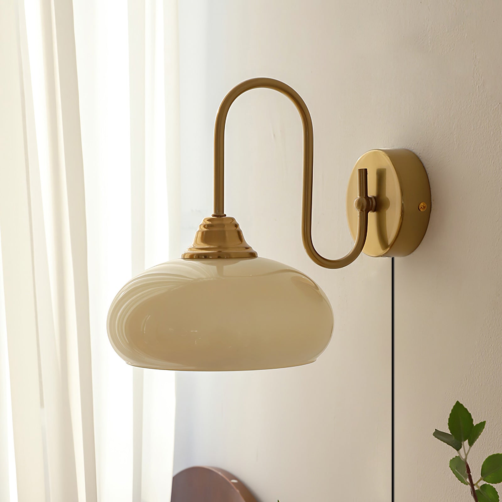 Modern Plug-in Wall Lamp with Clear Glass Shade and Brass Finish