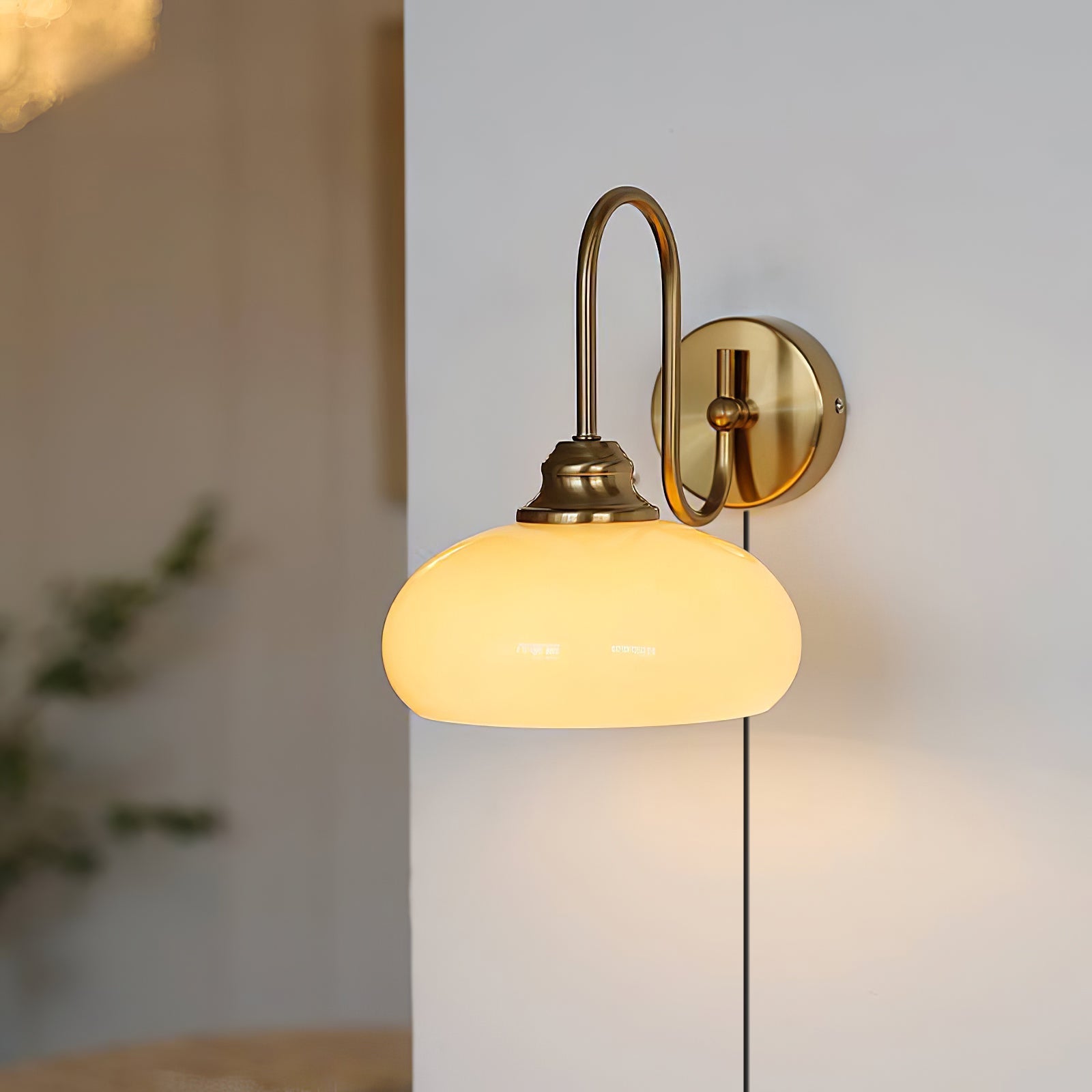 Modern Plug-in Wall Lamp with Clear Glass Shade and Brass Finish