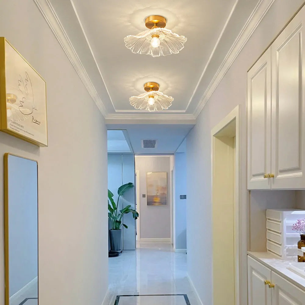 Flower-Shaped Pendant Light – Clear Glass Petals with Retro Brass Details